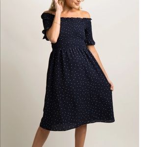 Maternity navy and white polka dot dress